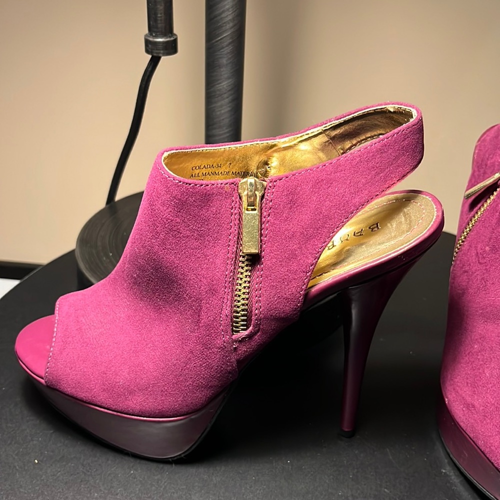 Purple peep hole stiletto heels